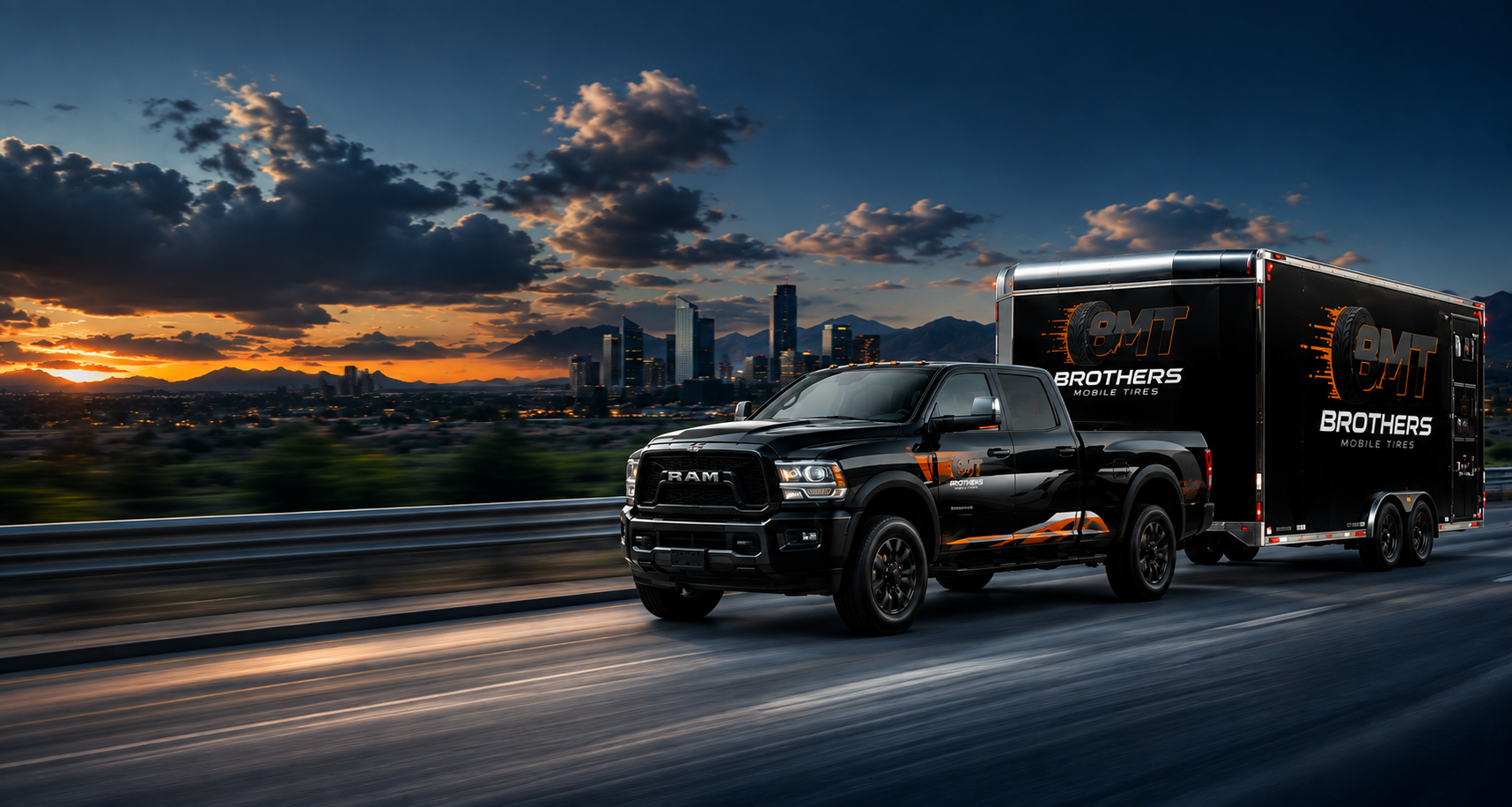 BMT truck towing the mobile tire trailer at sunset