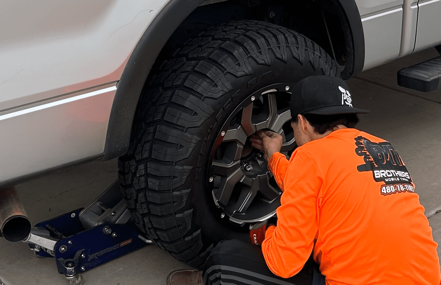BMT technician changing a tire